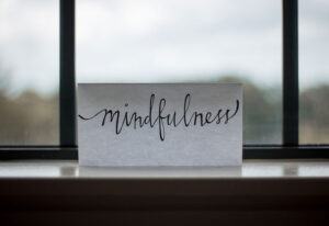 Paper sign that says "mindfulness"