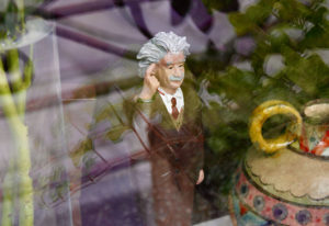 Einstein figurine in window