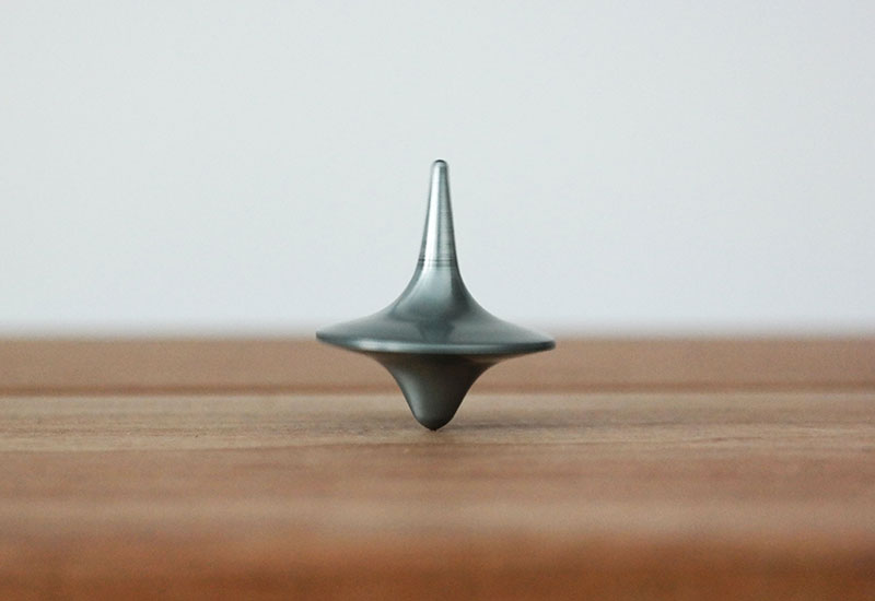 Spinning balanced top