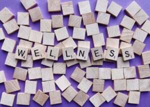 Tiles spelling out wellness