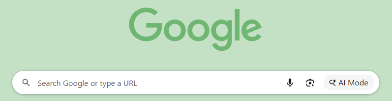 Screenshot of Google search box with AI Mode option on right side.